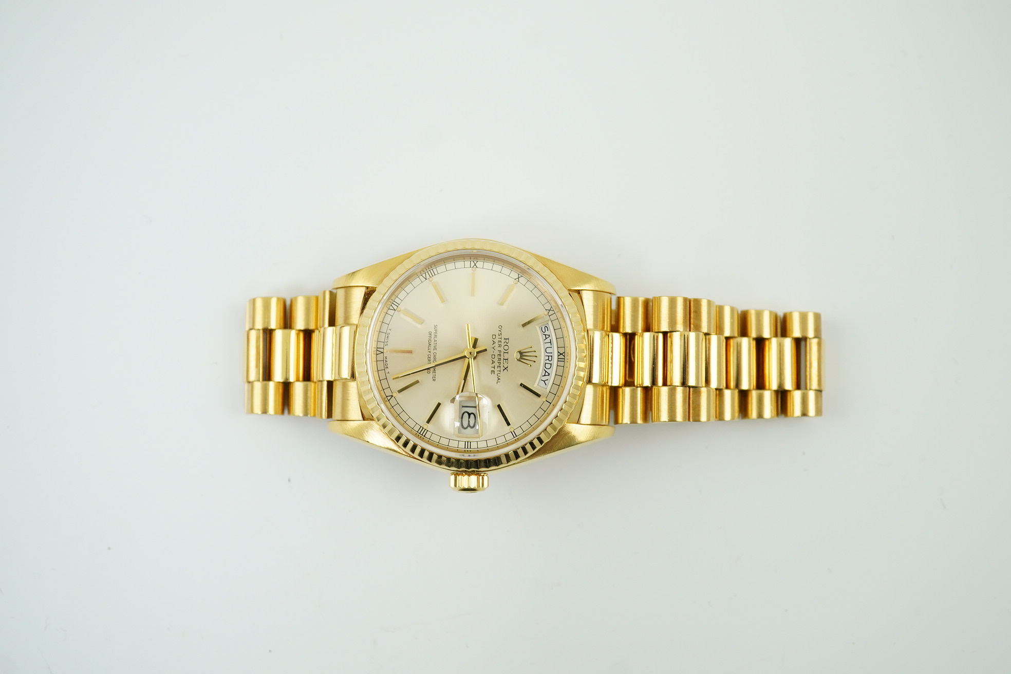 A gentleman's mid 1980's 18ct gold Rolex Oyster Perpetual Day-Date wrist watch, on an 18ct gold Rolex bracelet with deployment clasp